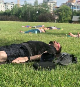 man sleeping in a garden